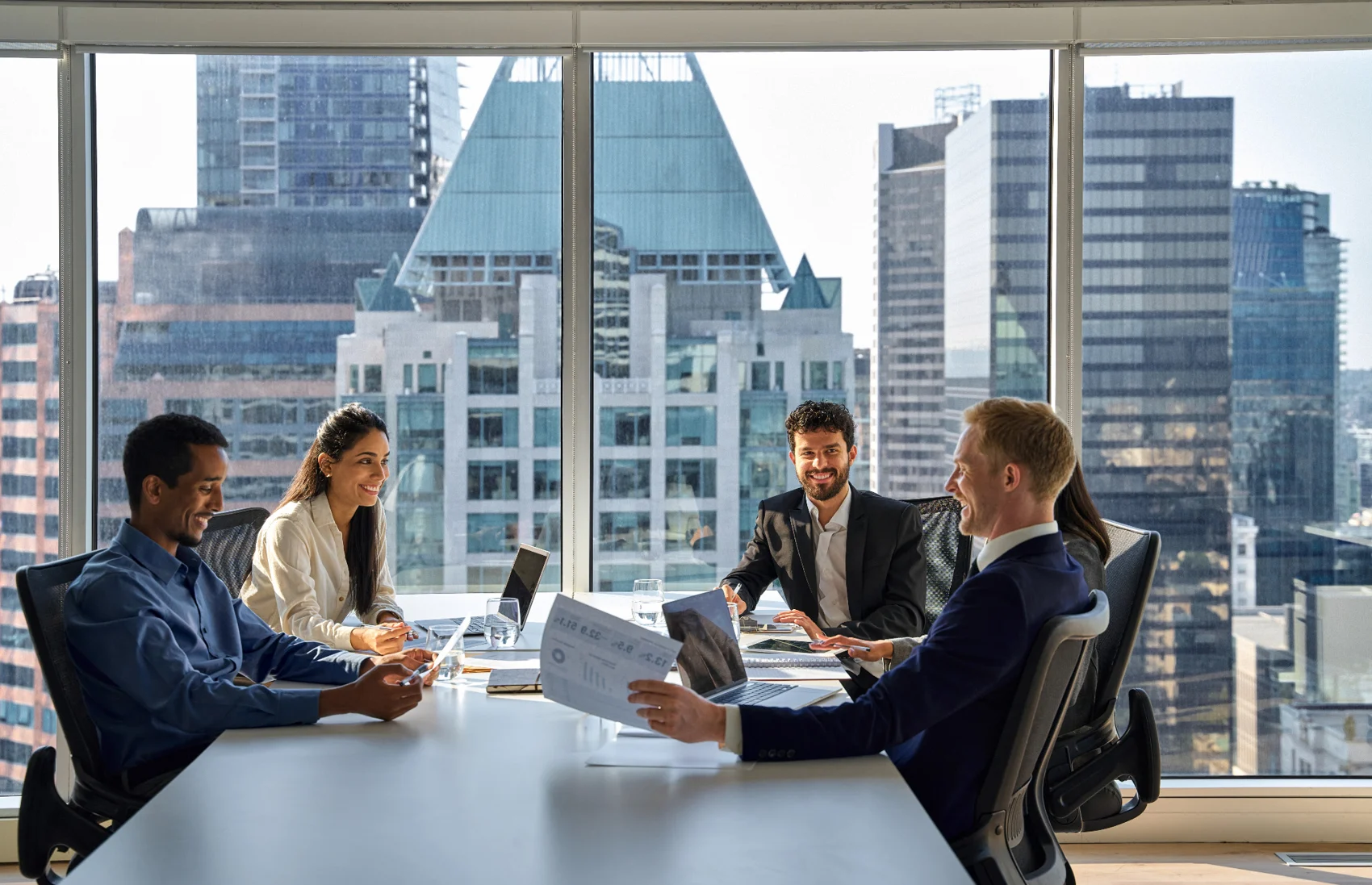 Business professionals meeting in a modern boardroom