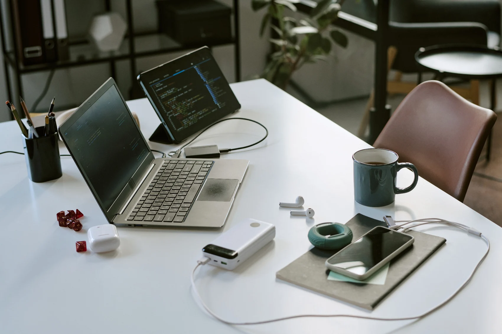 Laptop, tablet and connected devices on a desk